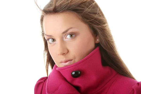 Dospívající žena v růžovou ženský kabát — Stock fotografie