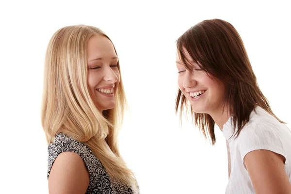 Happy young women friends laughing — Stockfoto
