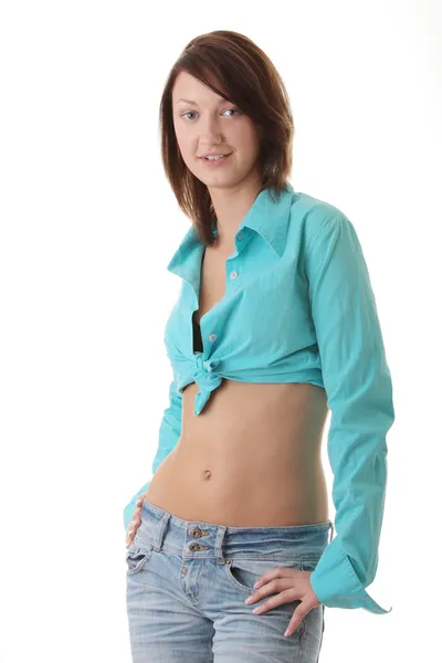 Sexy, fit žena v džínách, nahé břicho — Stock fotografie