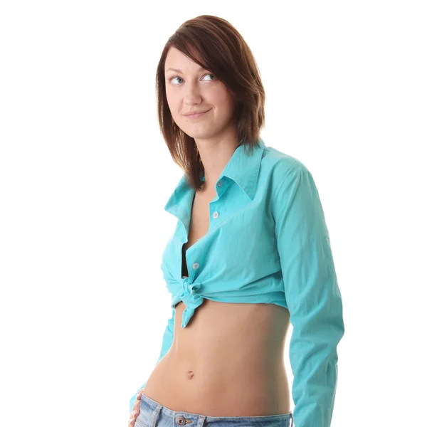 Sexy, fit vrouw in spijkerbroek, met naakte maag — Stockfoto