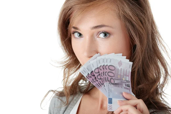 Szczęśliwa młoda kobieta trzyma pieniądze — Zdjęcie stockowe