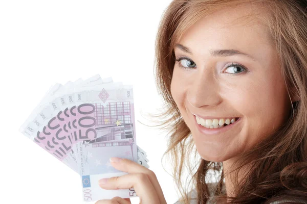 Ευτυχισμένη νεαρή γυναίκα που κρατάει χρήματα — Φωτογραφία Αρχείου