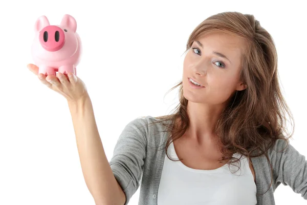 Jonge mooie vrouw permanent met piggy bank — Stockfoto