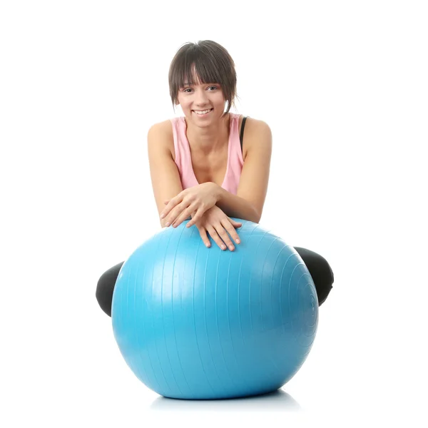 Beautiful young woman doing exercise Stock Photo