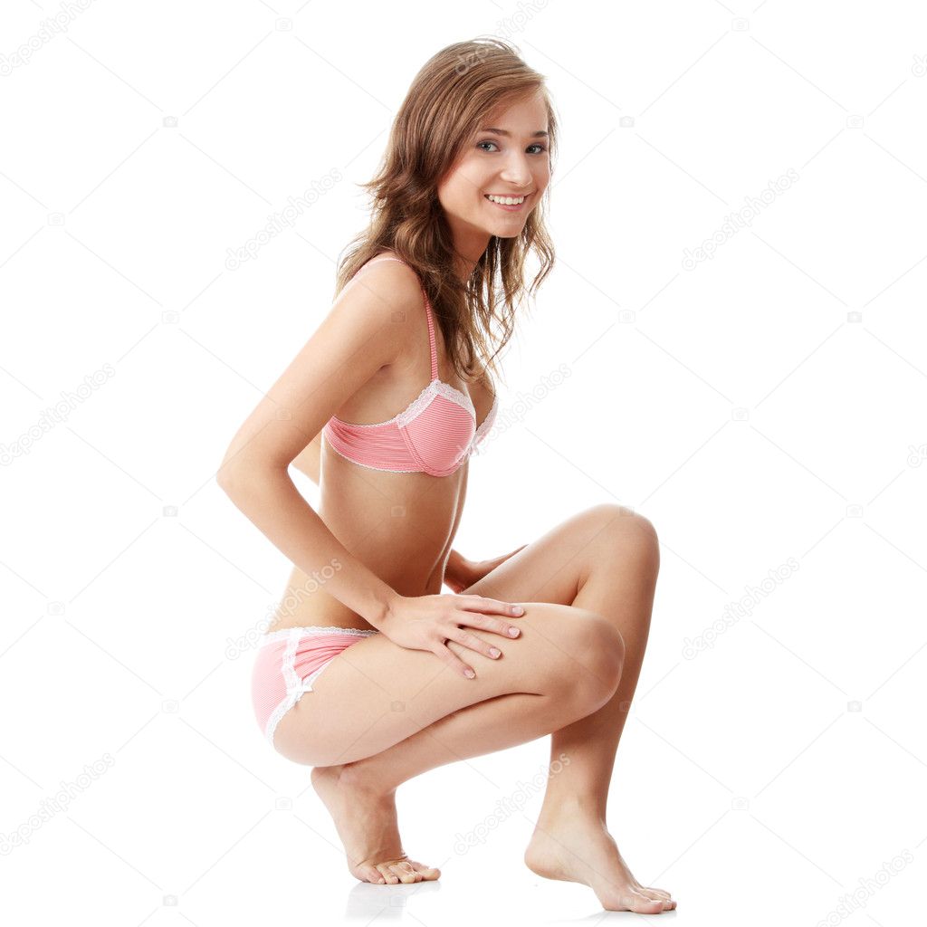 Beautiful Young And Sexy Woman In Pink Panties Onantique Wall Background  Stock Photo, Picture and Royalty Free Image. Image 18325492.