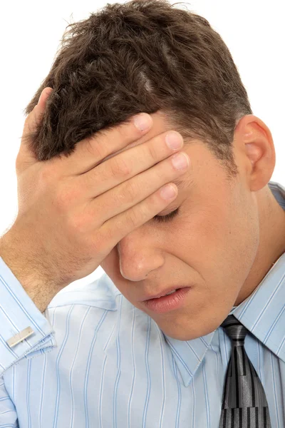 Affärsman med en stor huvudvärk — Stockfoto