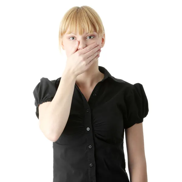Young woman covering her mouth — Stock Photo, Image