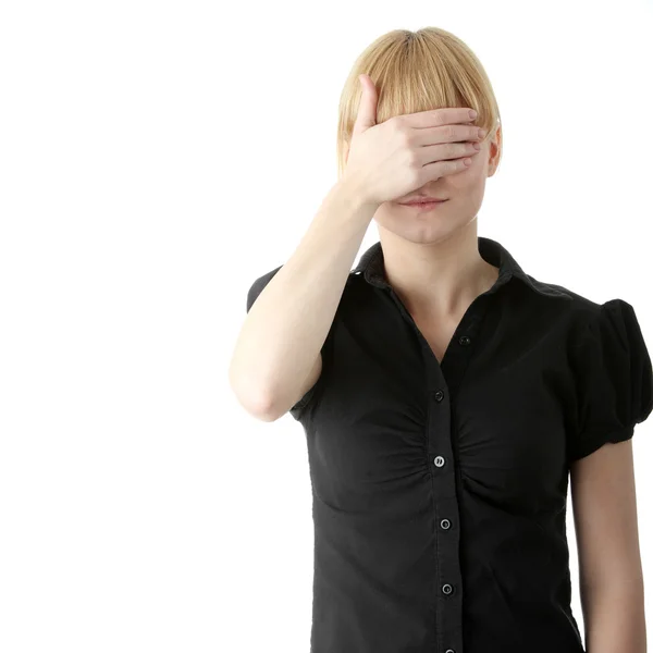Young woman covering her eyes — Stock Photo, Image