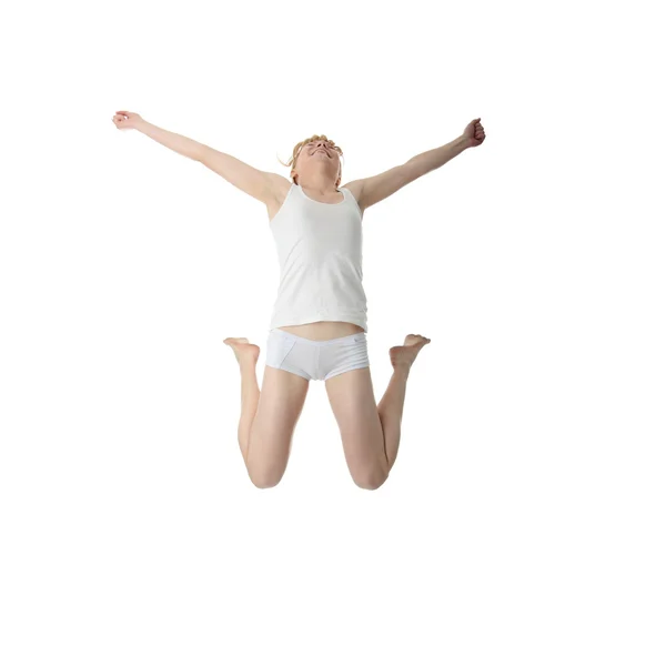 Joven mujer sonriente saltando — Foto de Stock