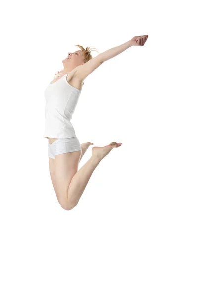 Young smiling woman jumping — Stock Photo, Image