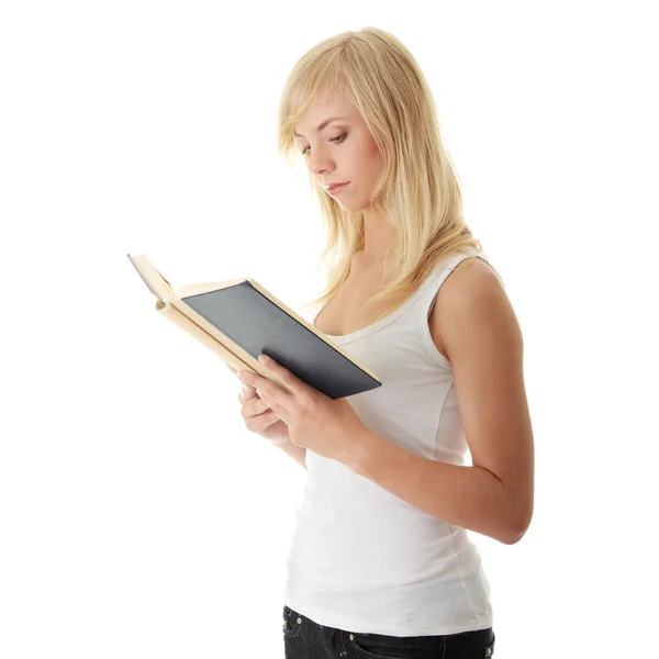 青少年的女人读的书 — 图库照片