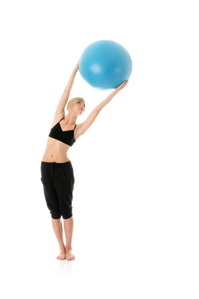 Young woman doing exercise — Stock Photo, Image