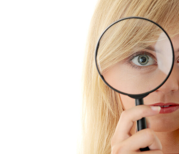 Teen girl with magnifier