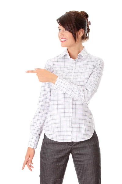 Young happy businesswoman pointing — Stock Photo, Image