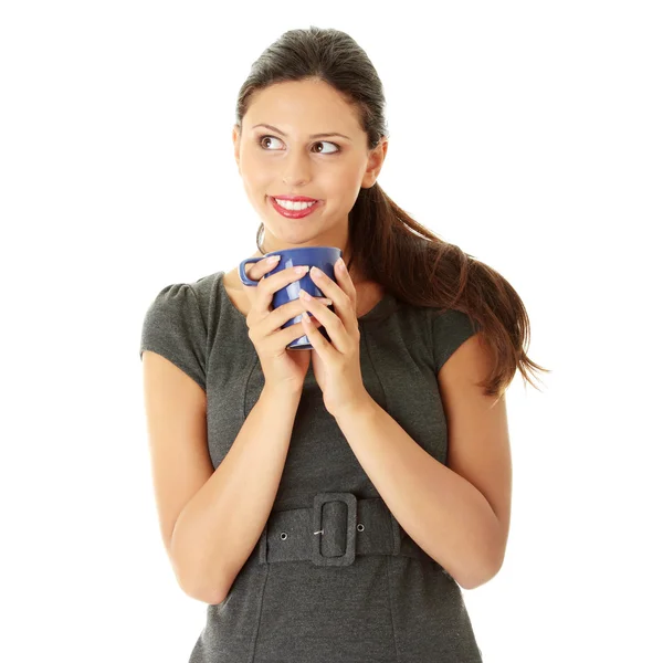 Affärskvinna som håller kaffekopp — Stockfoto