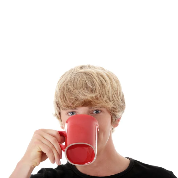 stock image Man drinking a coffee or tea