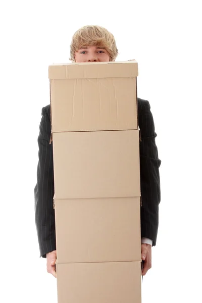 Geschäftsmann mit gestapelten Kisten — Stockfoto