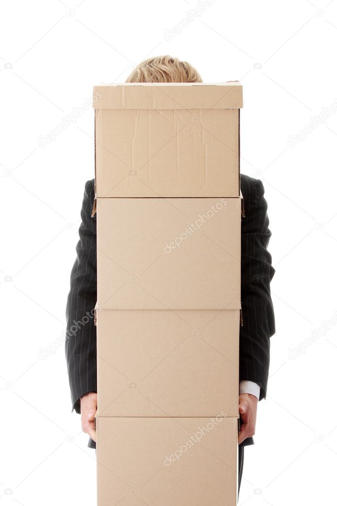 Businessman with stacked Boxes