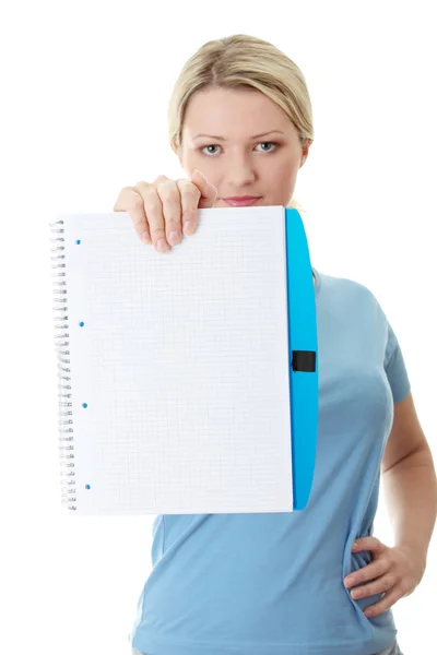Student woman holding blank copybook — Stock Photo, Image
