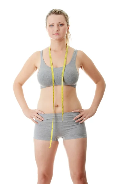 Mujer midiendo su cintura —  Fotos de Stock