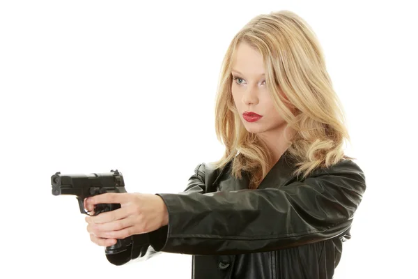 Sexig blond kvinna med pistol — Stockfoto