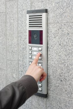 Video intercom in the entry of a house clipart