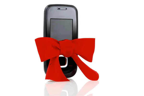 Black elegant, modern and mobile phone with red bow — Stock Photo, Image
