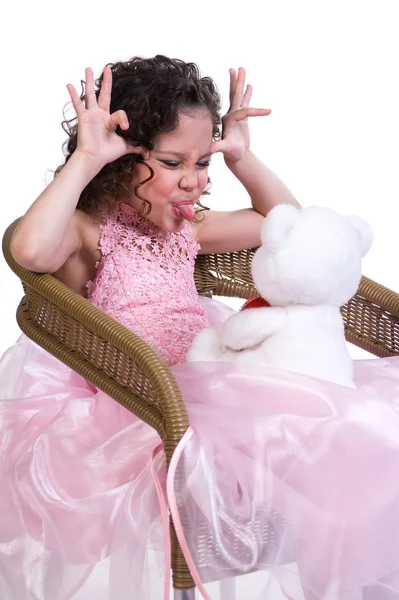 Stock image Funny little girl in a pink dress