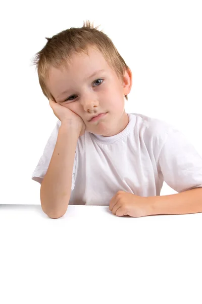 Portret van een jongen op een witte achtergrond — Stockfoto