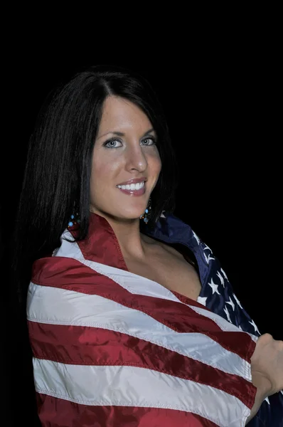 Vrouw in een vlag gewikkeld — Stockfoto