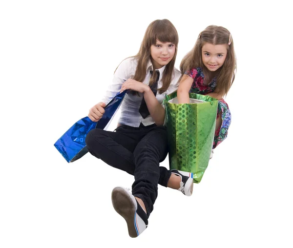 Meninas com dois sacos de compras . — Fotografia de Stock