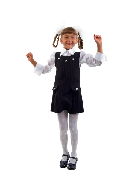 Weinig schoolmeisje springen van vreugde. — Stockfoto