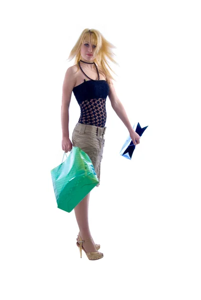 Κορίτσι Blondie και τσάντες αγορών. — Φωτογραφία Αρχείου