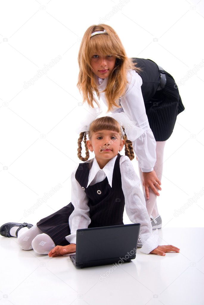 Two Schoolgirls And Laptop.