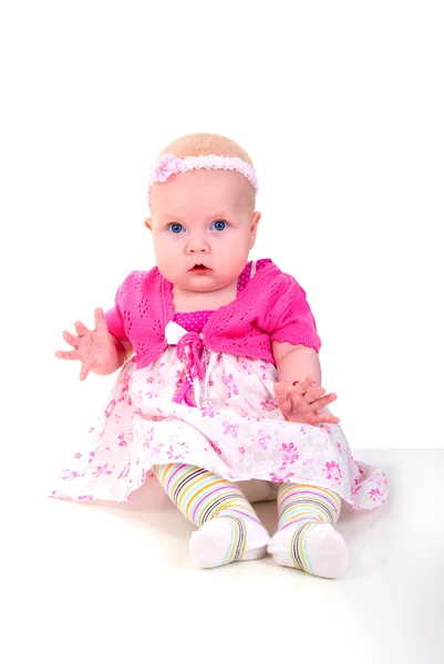 Baby meisje in roze. — Stockfoto