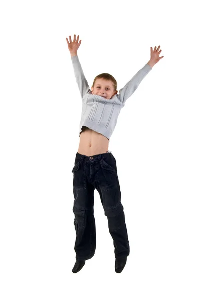 快乐的小男孩跳跃在中旬. — 图库照片