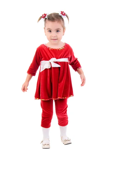 Klein meisje in een rode jurk. — Stockfoto