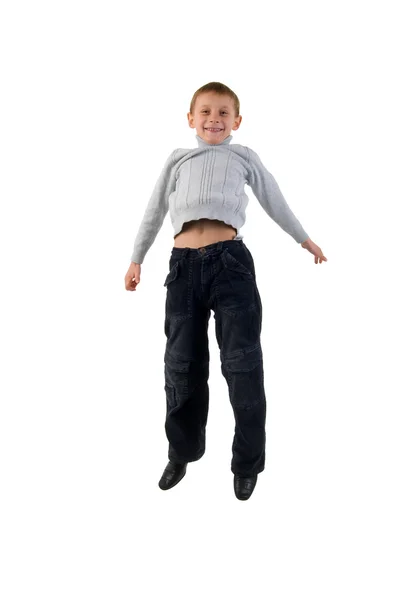 Kot pantolon çocuk atlama. — Stok fotoğraf