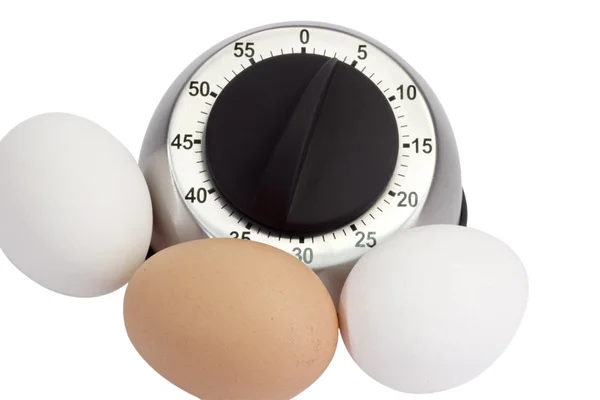 Uova con timer per uova — Foto Stock