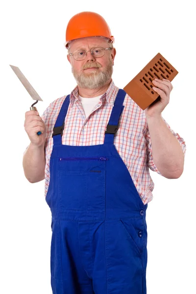 Bricklayer with brick and trowel — Stock Photo, Image