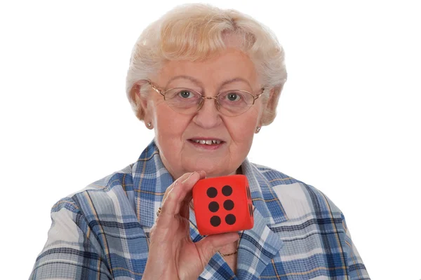 Старшая женщина с кубиками — стоковое фото