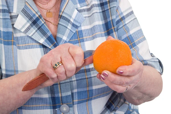 Peeling an orange — Stock Photo, Image