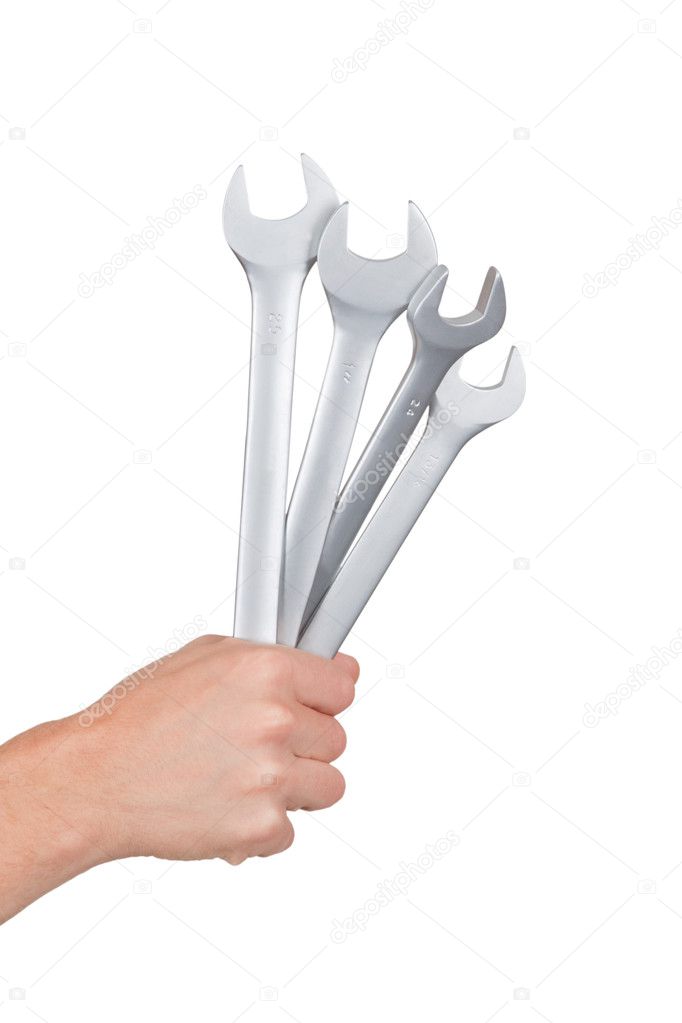 Hand with wrenches