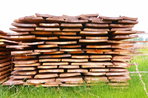 Boards on a grass — Stock Photo, Image