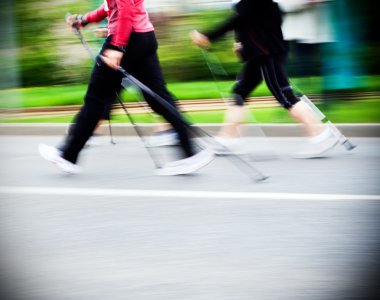 Nordic walking race, motion blur clipart