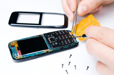 Mobile phone repair services clipart