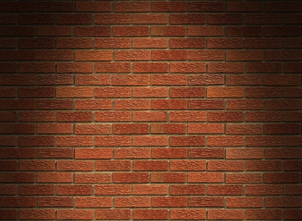 Red brick wall lit from above — Stock Photo, Image