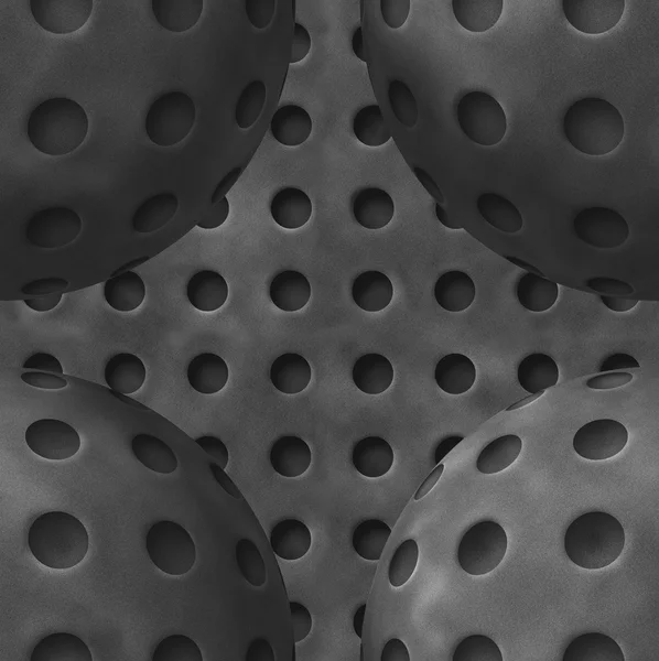 Iron gray metal spheres with holes — Stockfoto