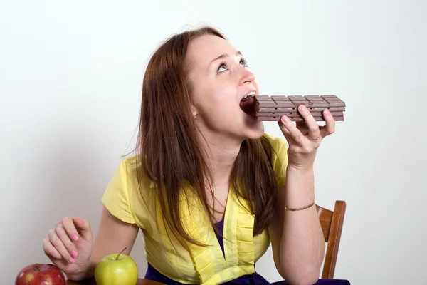 The girl with chocolate — Stock Photo, Image