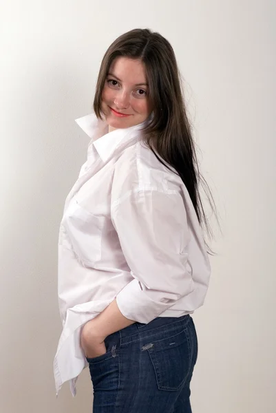 Portrait of a young girl in a white shir — Stock Photo, Image